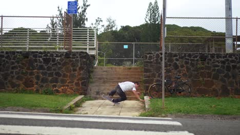 skateboarder takes a heavy slam skating down the 9 stair