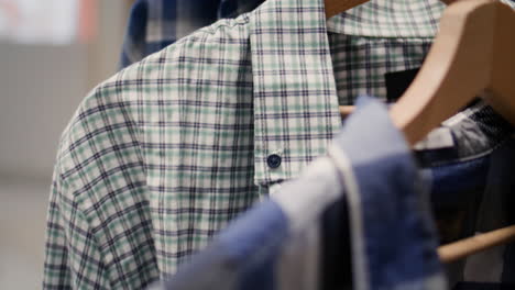 colorful shirts in thrift shop