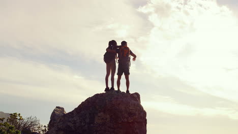 Athletic-couple-hiking,-enjoying-view