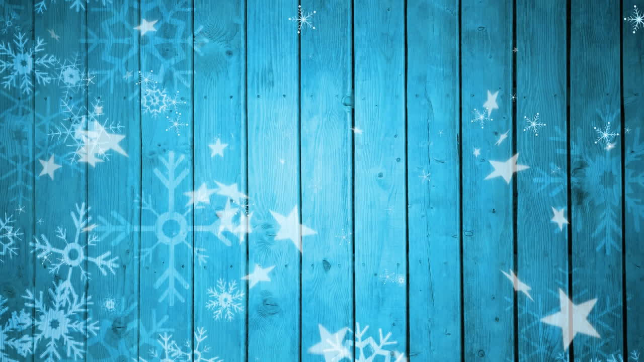 Animation of falling snowflakes and stars on blue wooden background
