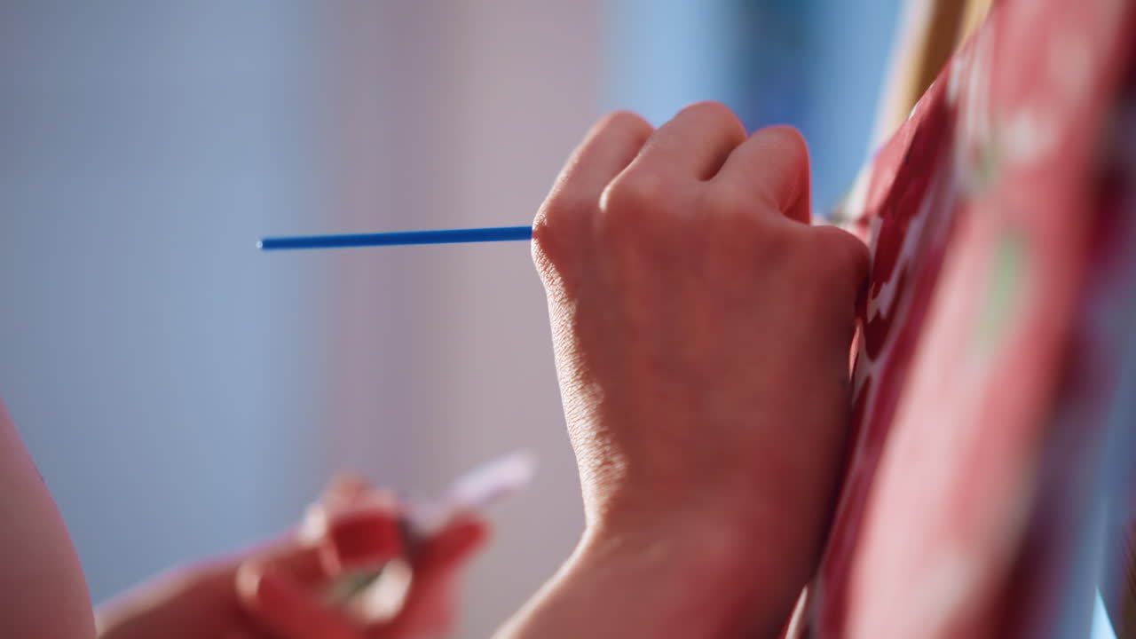 Artistic Focused Painting, Artist Skillfully Applying Paint With Steady Hand On Vibrant Canvas, Close Examination Of Painter Demonstrating Precise Technique While Working On Bright Flower Artwork