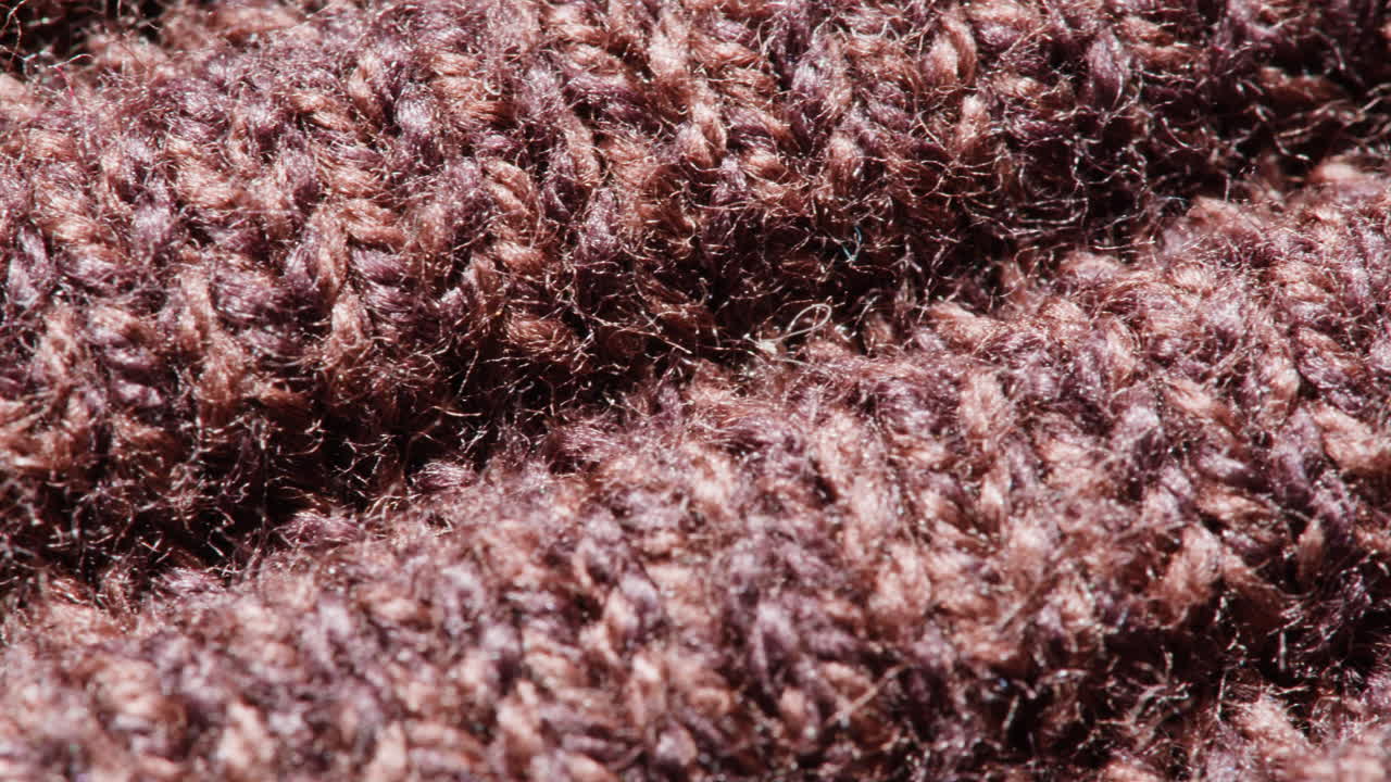 Close-up of Brown Knitted Fabric Texture