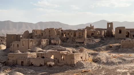 mud brick building landscape of houses in ruin rural village town in khorasan middle east usa arizona abandoned settlement mountain landscape of old city desert landscape in summer iran harvest season