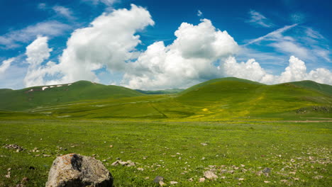 Cloud-cells-build-in-sky-atop-Didveli-Mountains-near-alpine-Tabatskuri-Lake,-Ktsia-Tabatskuri-Managed-Reserve,-Georgia---Timelapse