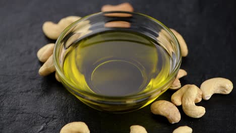 fresh made cashew oil on a rotating plate (seamless loopable)