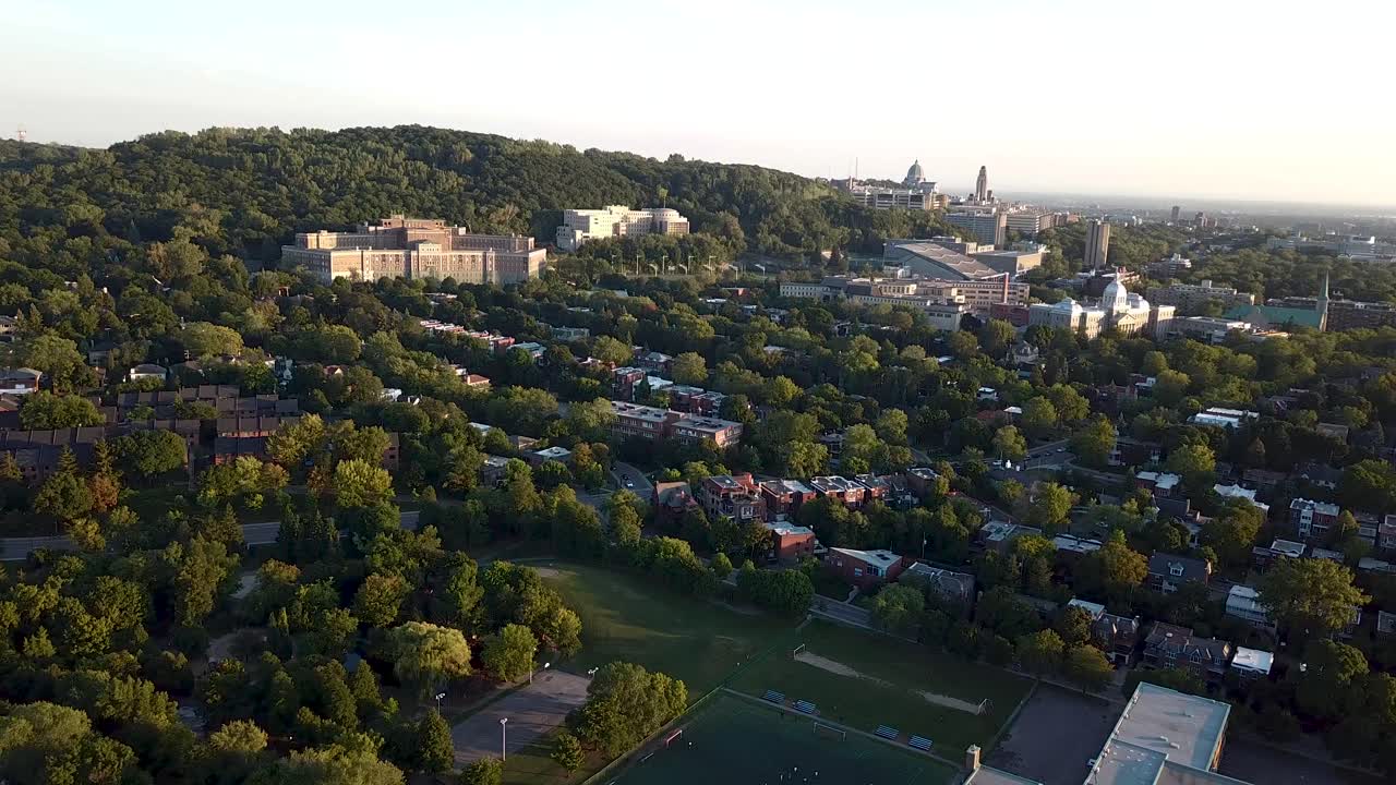 Aerial shot of the Mount-Royal and a soccer field on a summer day in Montreal, Quebec, Canada
