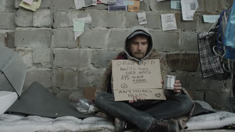 homeless man begging for help and money on the street