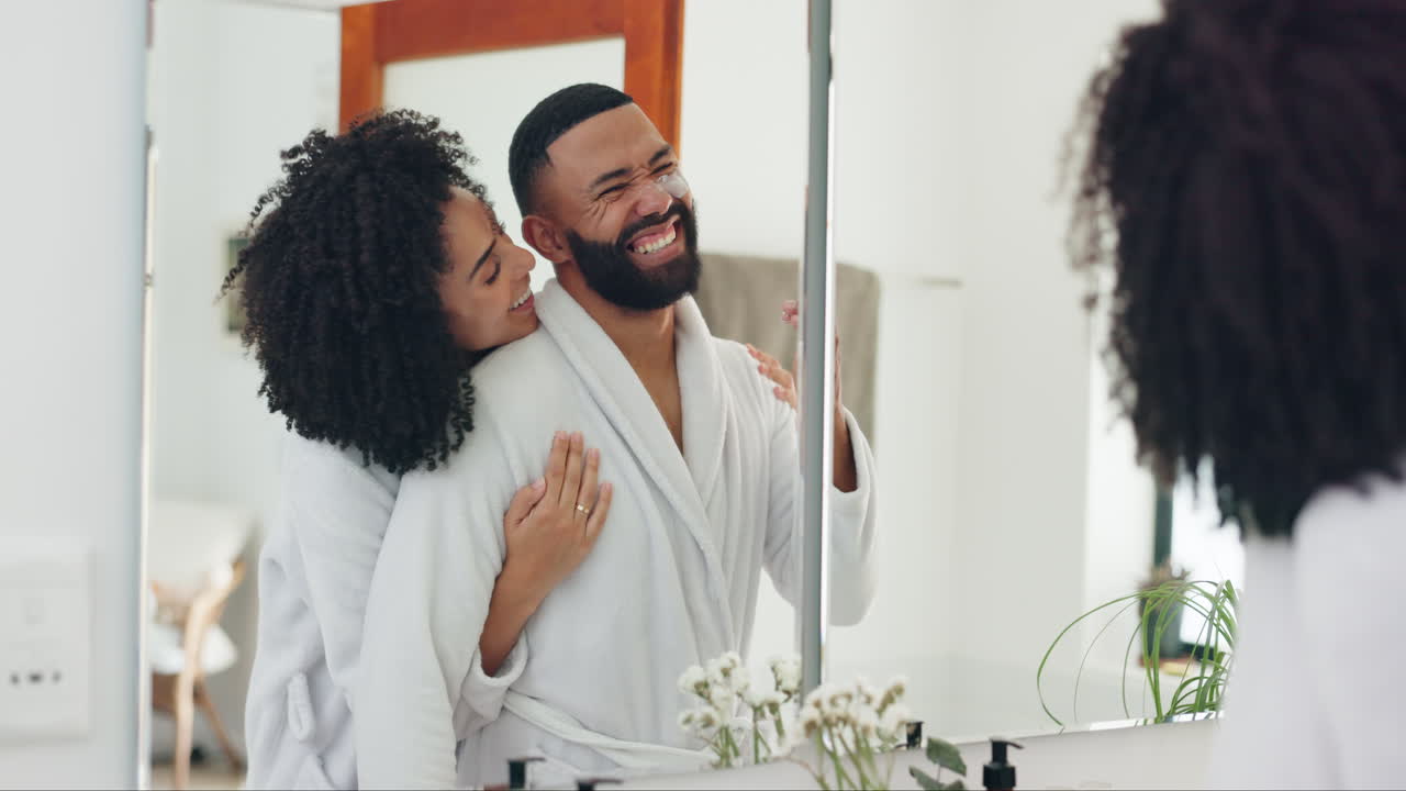 Couple Grooming Together in Bathroom