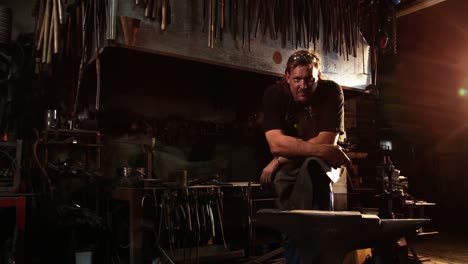 portrait of blacksmith standing