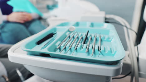 dental instruments on a tray in a dentist's office