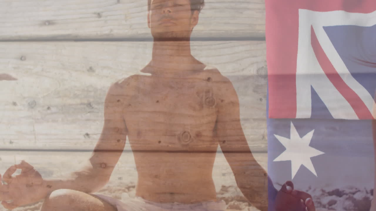 Meditating on beach, man with Australian flag animation overlay on wood texture