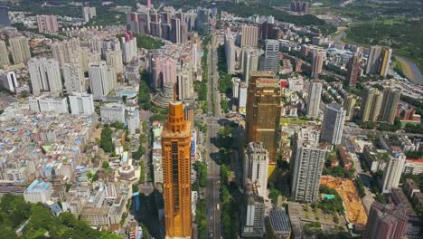 china sunny day shenzhen cityscape golden building traffic road aerial panorama 4k