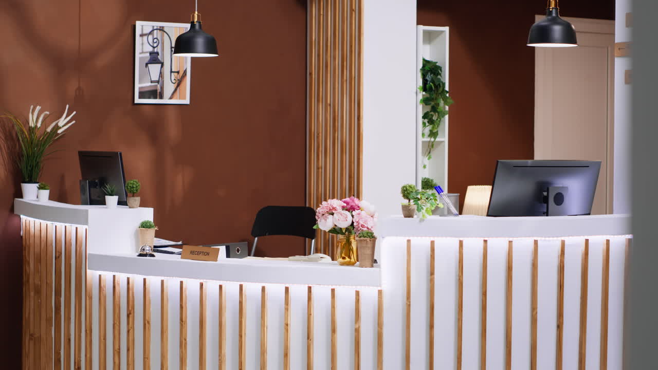 Stylish reception desk and lounge area with trendy decorations