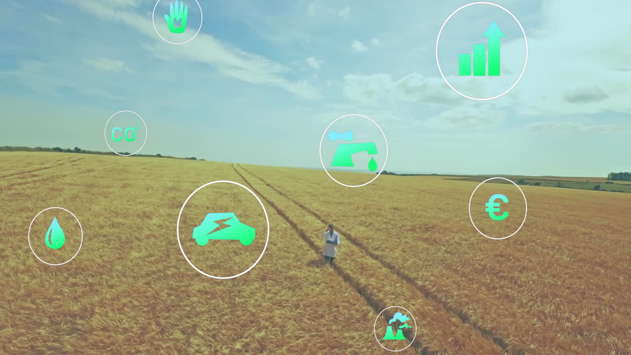 Male farmer speaking on smartphone in wheat field, showing floating sustainability icons