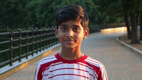 smiling boy in a park