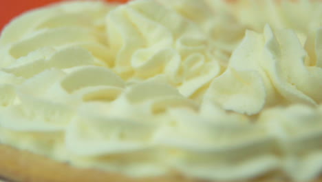 [camera used: canon c300] macro shot rotating pie loaded with fluffy whipped cream