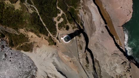 castlepoint lighthouse aerial look down orbit shot