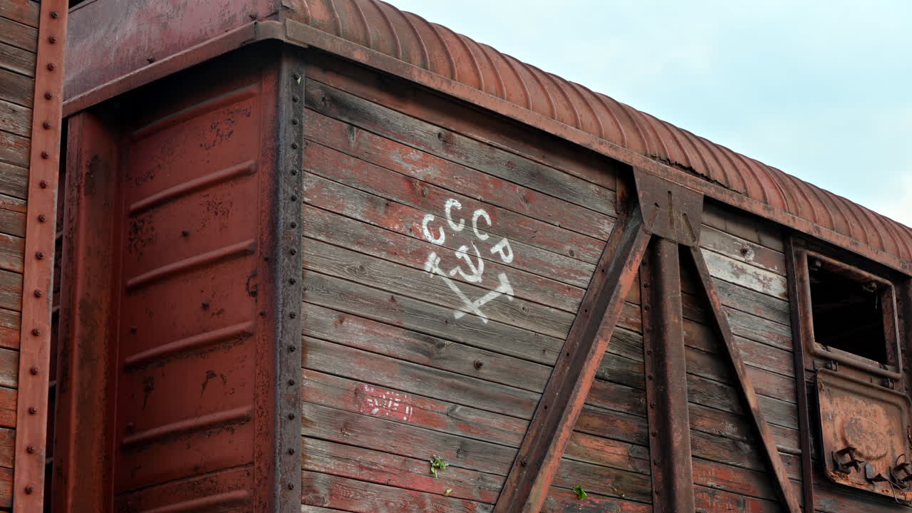 An old train car with a USSR sign symbolizing communist deportations in Chisinau, Moldova