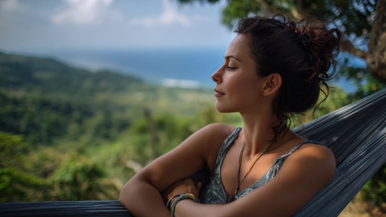 Contemplative Woman Enjoys Nature's Serenity in a Hammock Overlooking a Breathtaking Landscape with Lush Greenery and Ocean Views