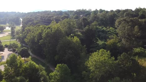 rising reveal shot over carrier park in asheville nc