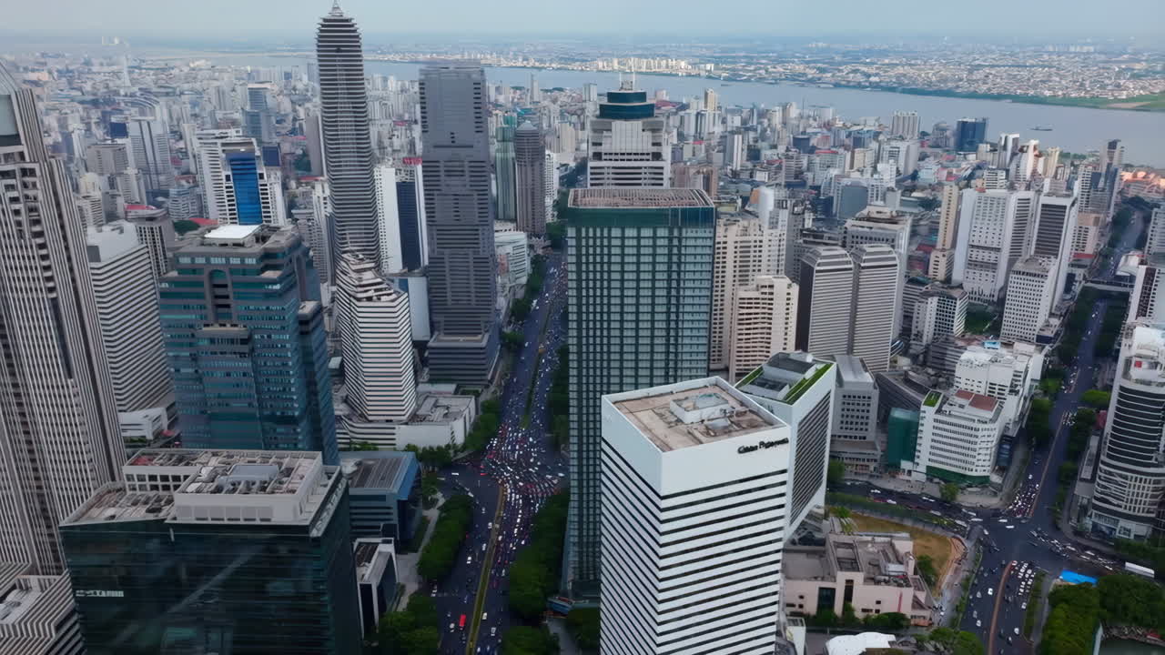 Aerial View of a Bustling City with Skyscrapers and Traffic