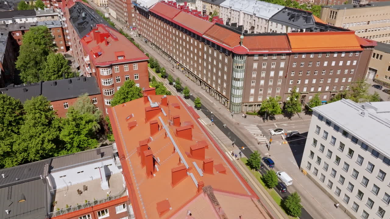 Drone rotating over the streets of Toolo, sunny, summer day in Helsinki, Finland