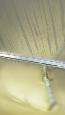 production of butter at dairy plant. butter production at dairy food industrial line vertical video
