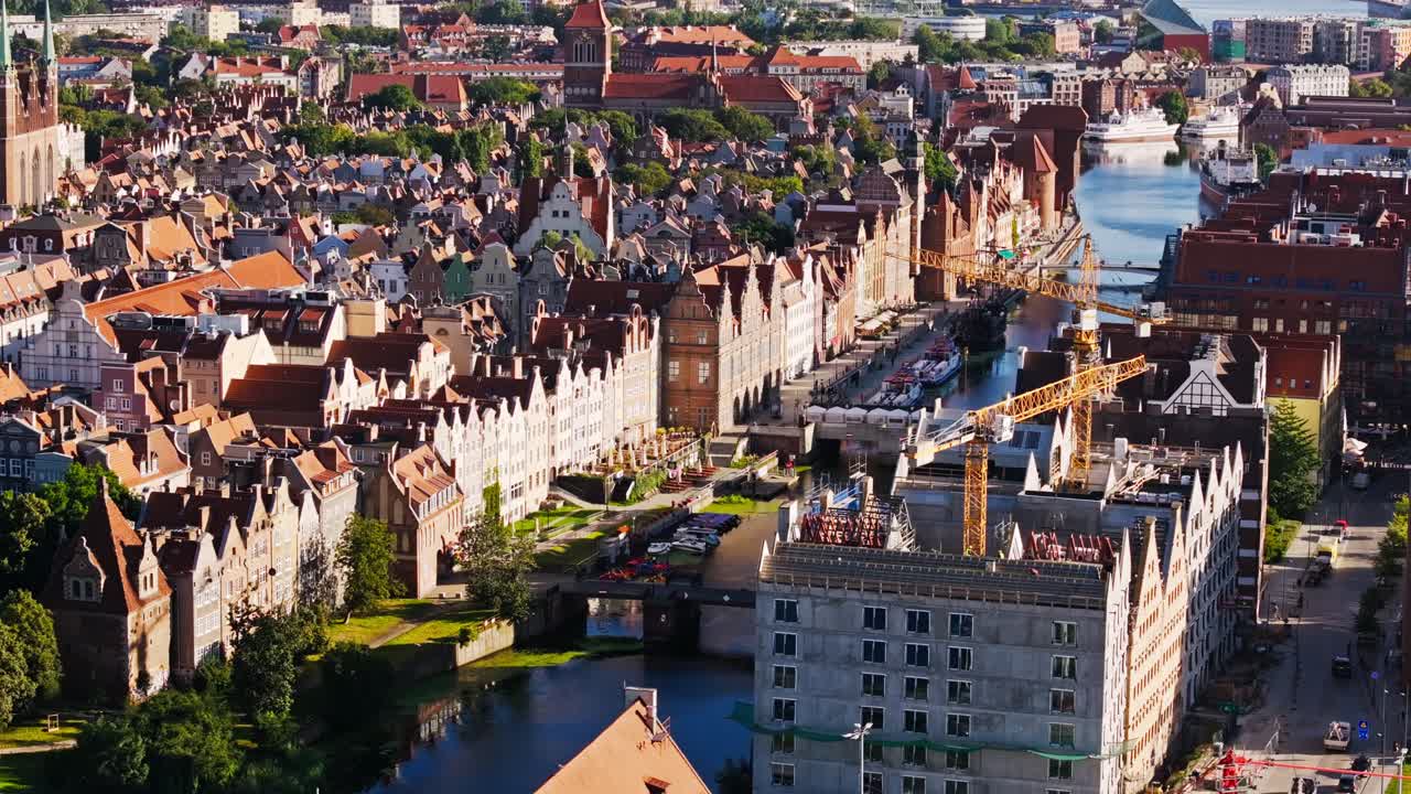Cinematic drone side flight showing Gdansk as symbol of courage and unity