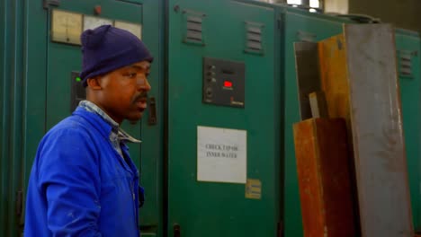 worker working in foundry workshop 4k