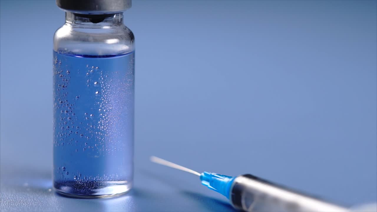 Vaccine Vial and Syringe