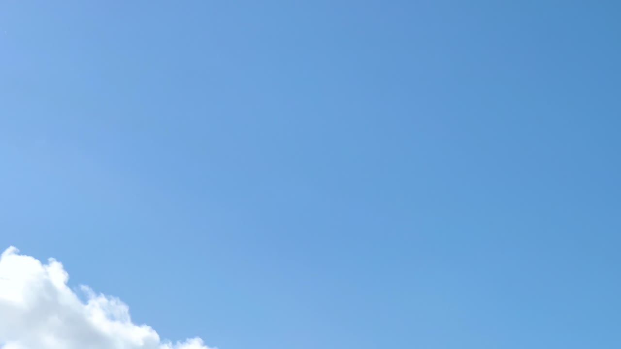 An F-22 Raptor jet performs aerial maneuvers against a clear blue sky during the Avalon Airshow in Geelong, Australia