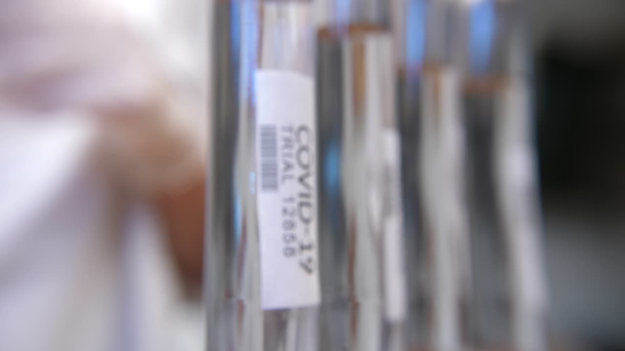 Close-up of COVID-19 Trial Test Tubes in a Laboratory