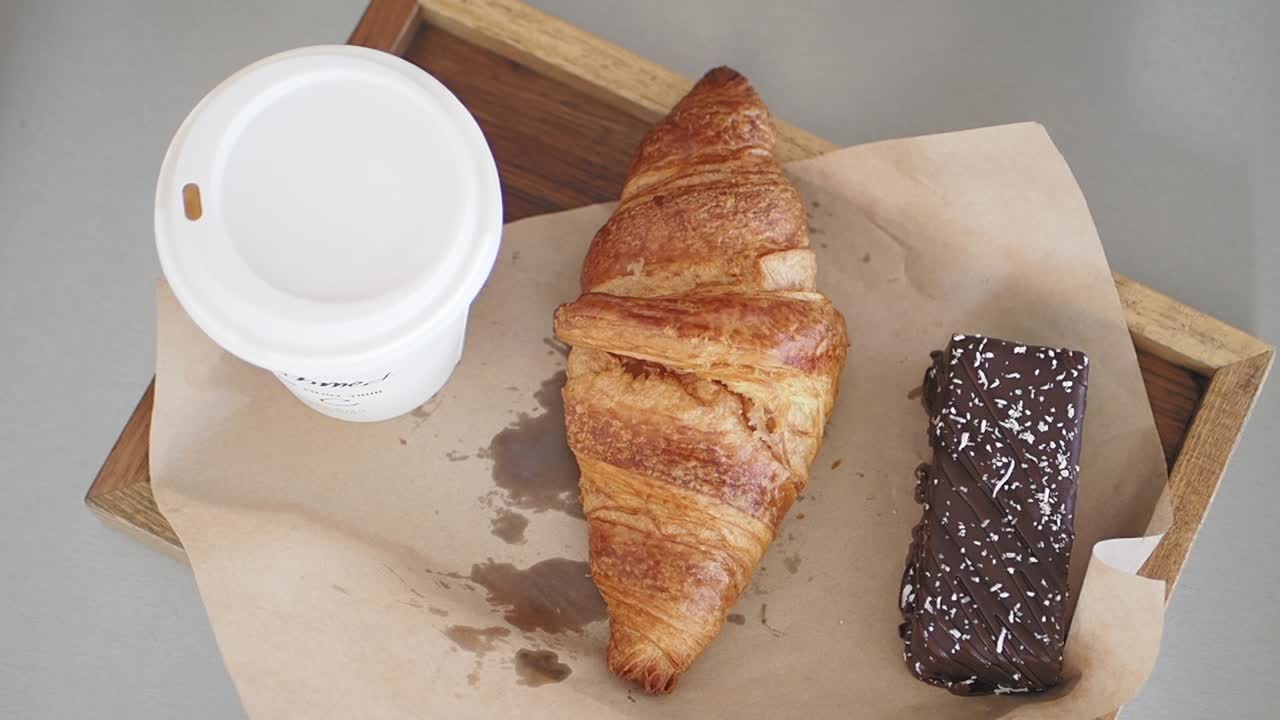 Breakfast at the cafe with coffee and pastries