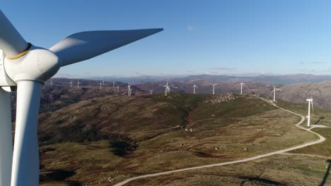 wind turbines producing alternative energy aerial view