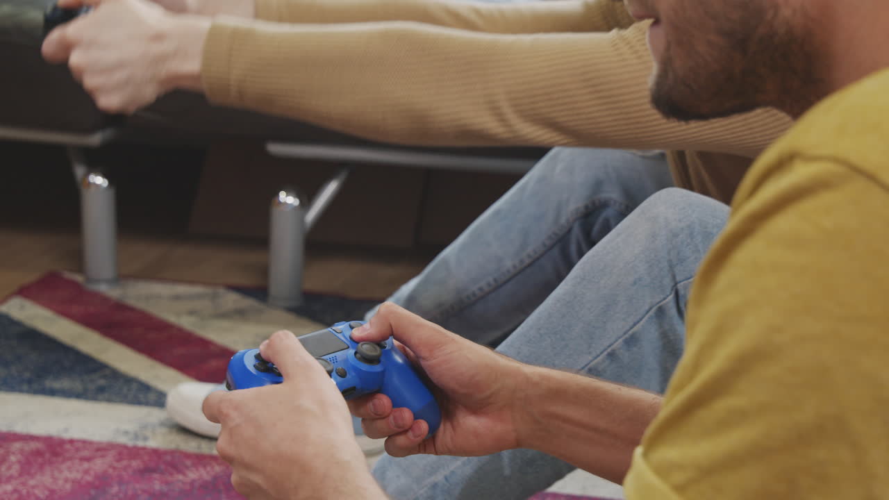 Unrecognizable Man Playing Video Game