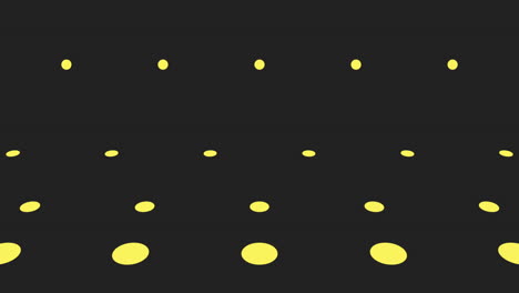 lively yellow dot pattern on black background creates vibrant repetition