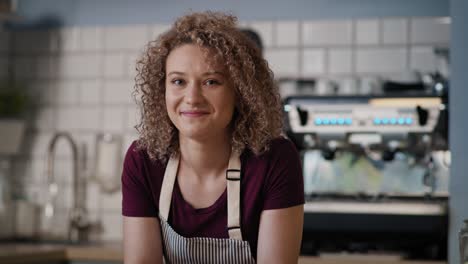 Caucasian-man-with-down-syndrome-preparing-a-meal-to-take-away-in-commercial-kitchen.