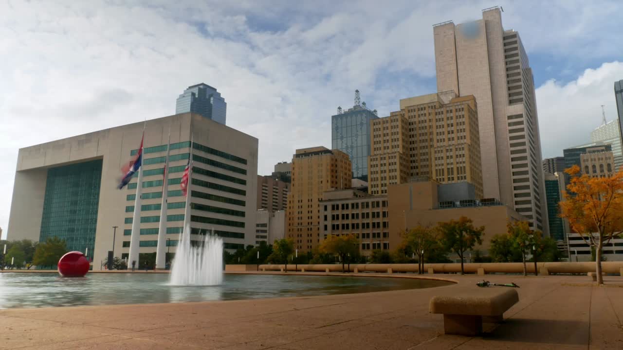 Timelapse of water fountain at Dallas City Hall with AT and T building in the background