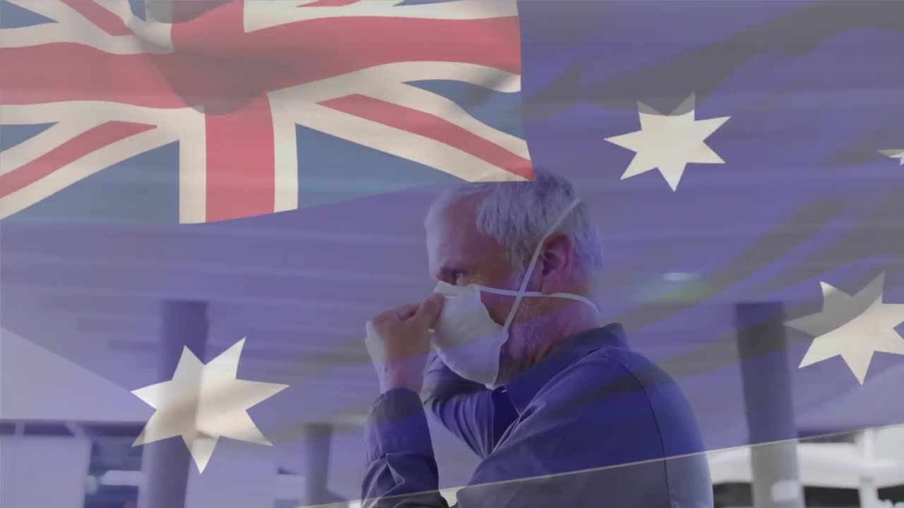 코로나 19 대유행 기간 동안 마스크를 쓴 남자가 호주 국기를 흔들고 있는 애니메이션