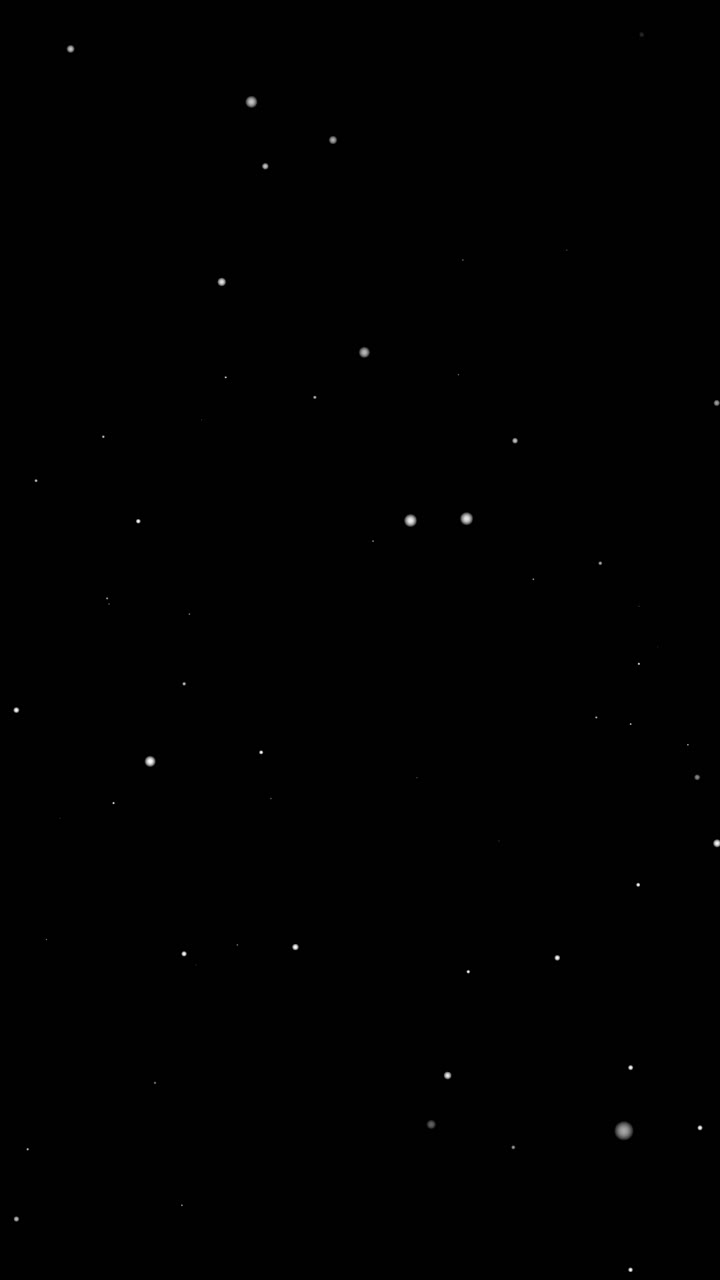 Snow falling on black background