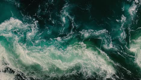 waves of water of the river and the sea meet each other during high tide and low tide.