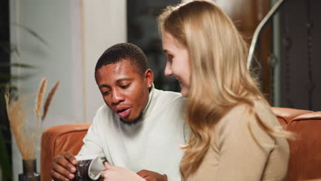 black man surprised with news of beloved wife pregnancy