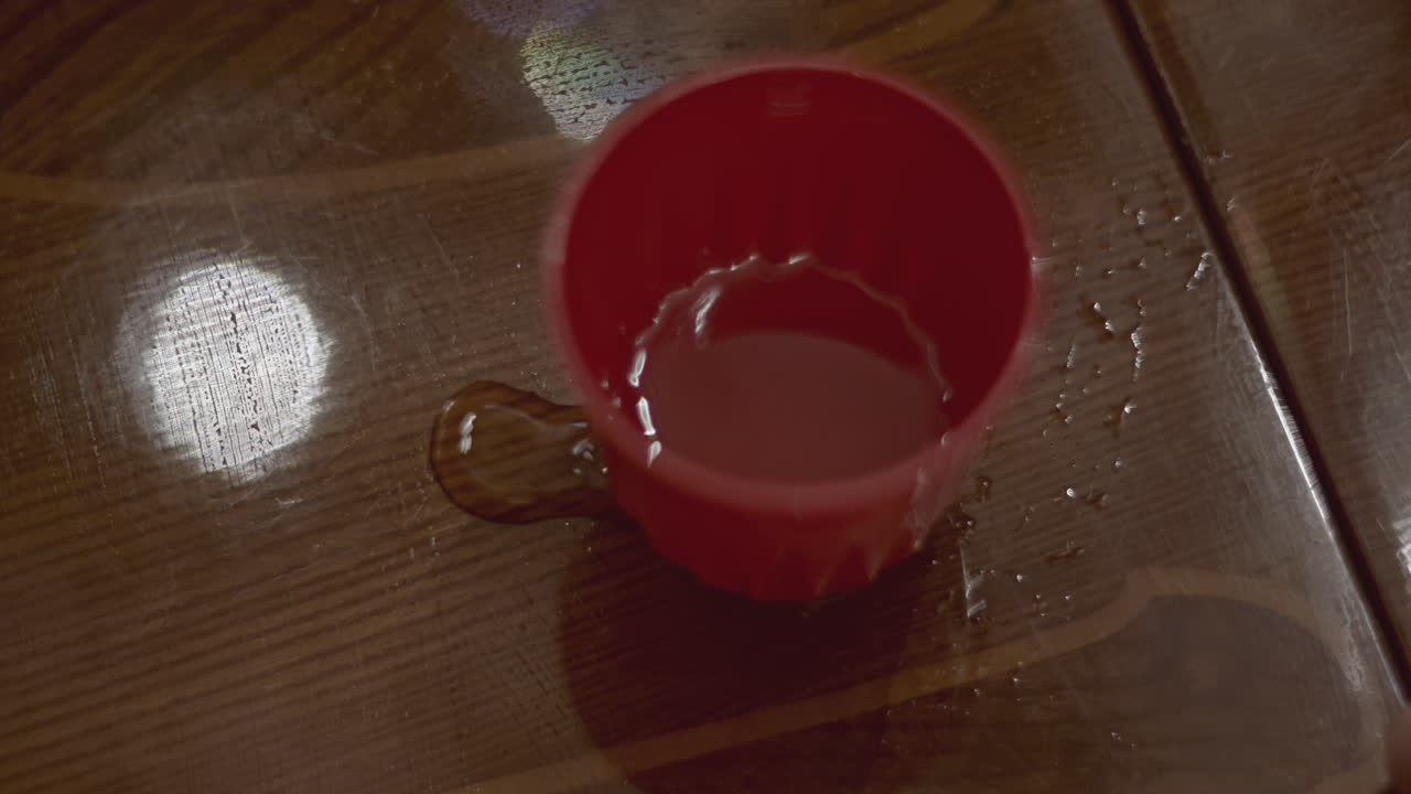 Red Plastic Cup on a Wooden Table