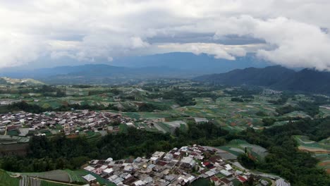 Landscape-of-Indonesia---villages,-fields-and-mountains,-aerial-drone-view