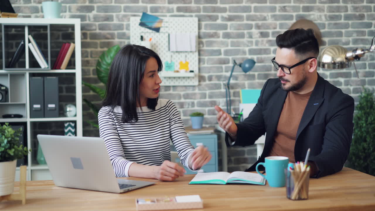 Business Colleagues Working Together in Office