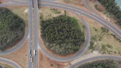 Loop-ramps-of-cloverleaf-interchange-on-Nairobi-Southern-Bypass,-aerial-top-view