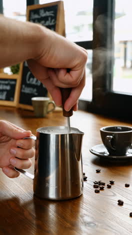 Preparing Coffee in a Cafe