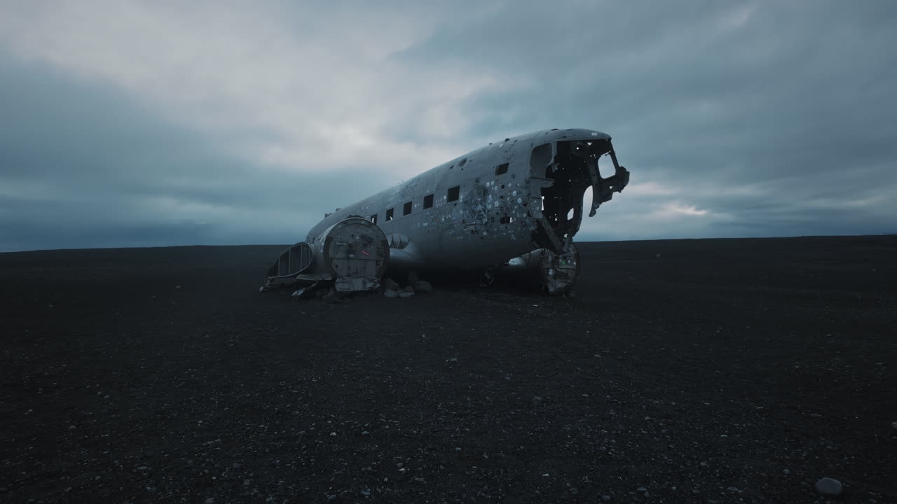 Wrecked airplane on black sand beach in Iceland