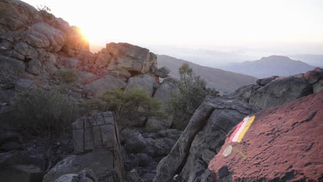 Mountain-hiking-trail-during-sunrise-in-the-Mountains-of-Oman