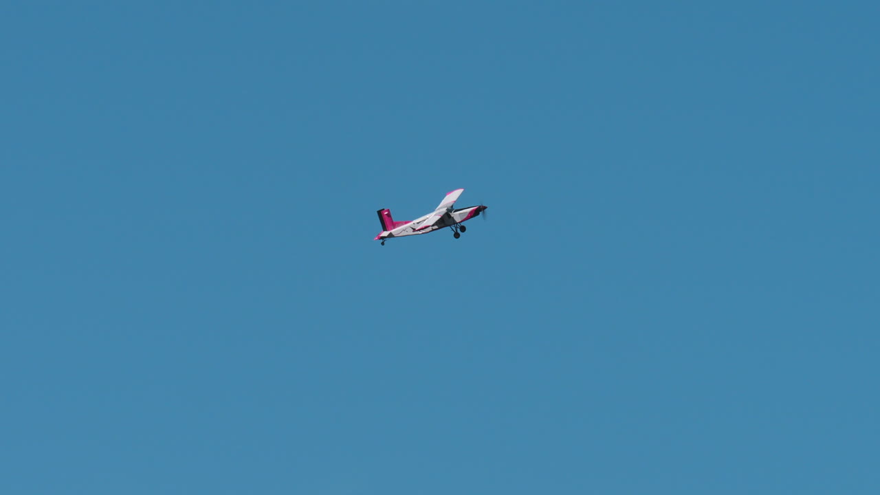 Small Airplane Against Blue Sky